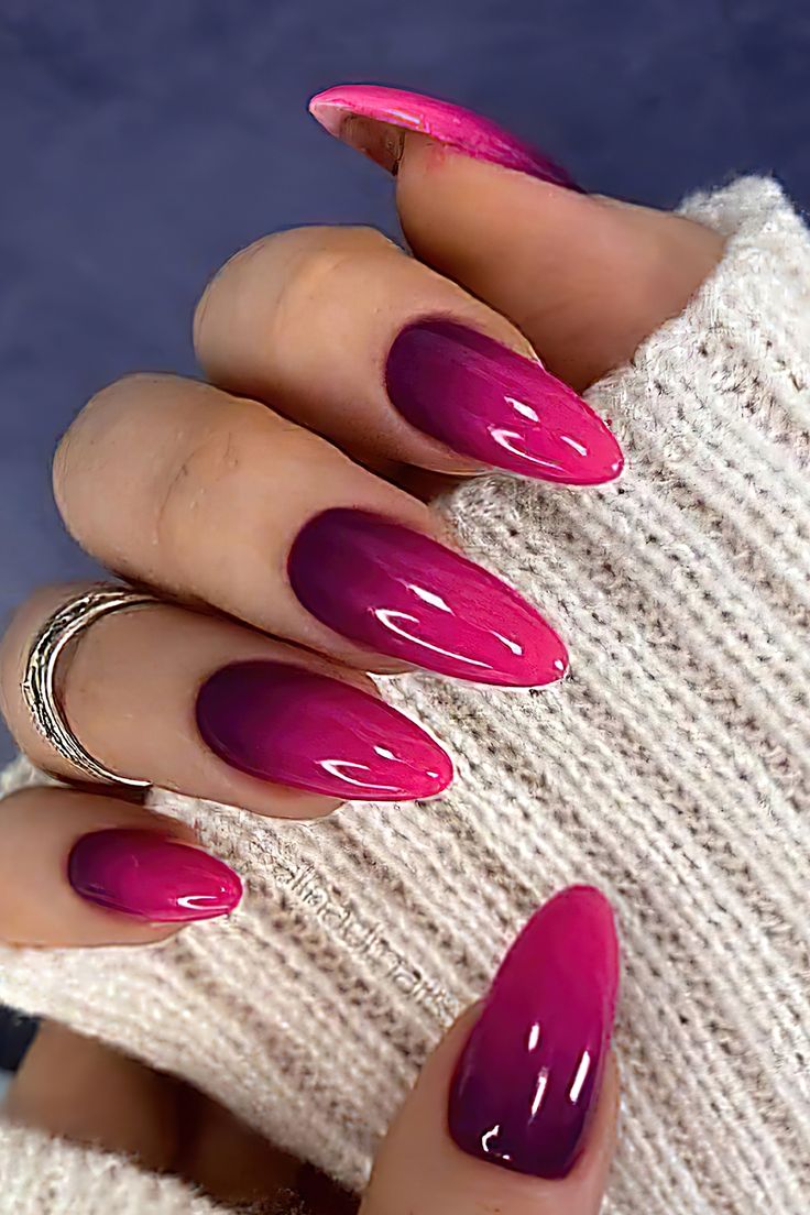 Vibrant Pink Ombre Nail Design with Elegant Almond Shape