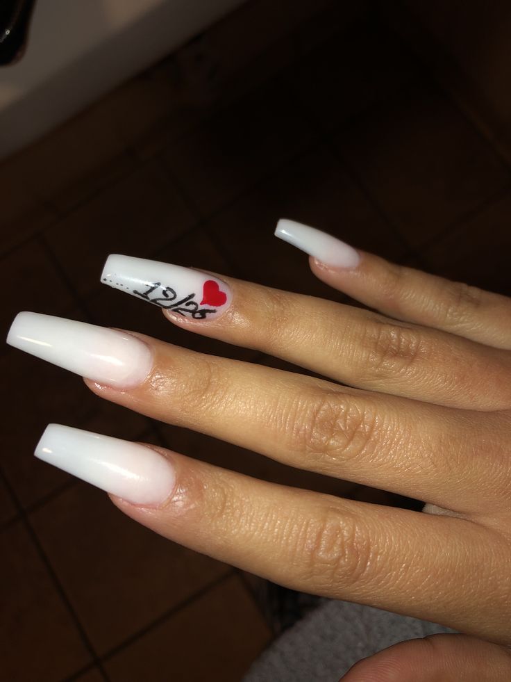 Chic Acrylic Nails: Stylish Soft White Gradient with Playful Personal Touch.