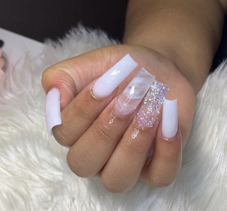 Elegant Glossy White Long Nails with Glitter Accent for Versatile Glamour.