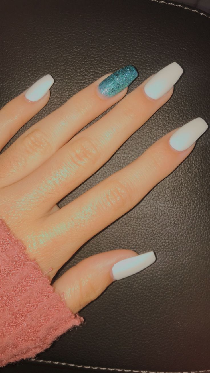 Sophisticated Long White Nails with Teal Glitter Accent for a Chic Look.