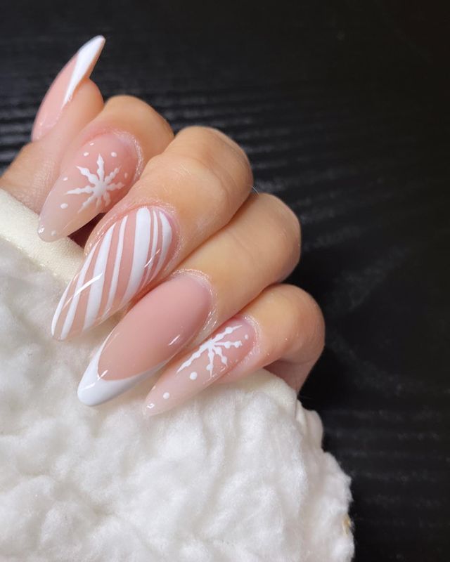 Chic Almond-Shaped Nails: Soft Nude and Crisp White with Modern Designs