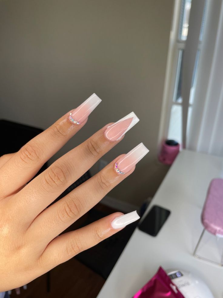 Timeless French Tip Acrylic Nails with Glossy Nude Base and Rhinestone Accents