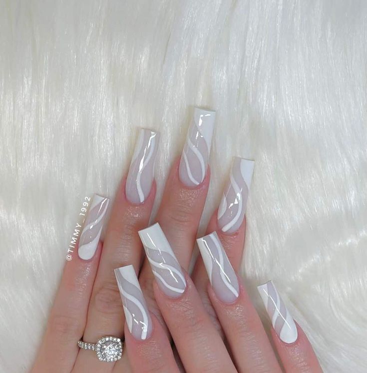 Contemporary Elegant Nails: Creamy White Base with Swirling Designs