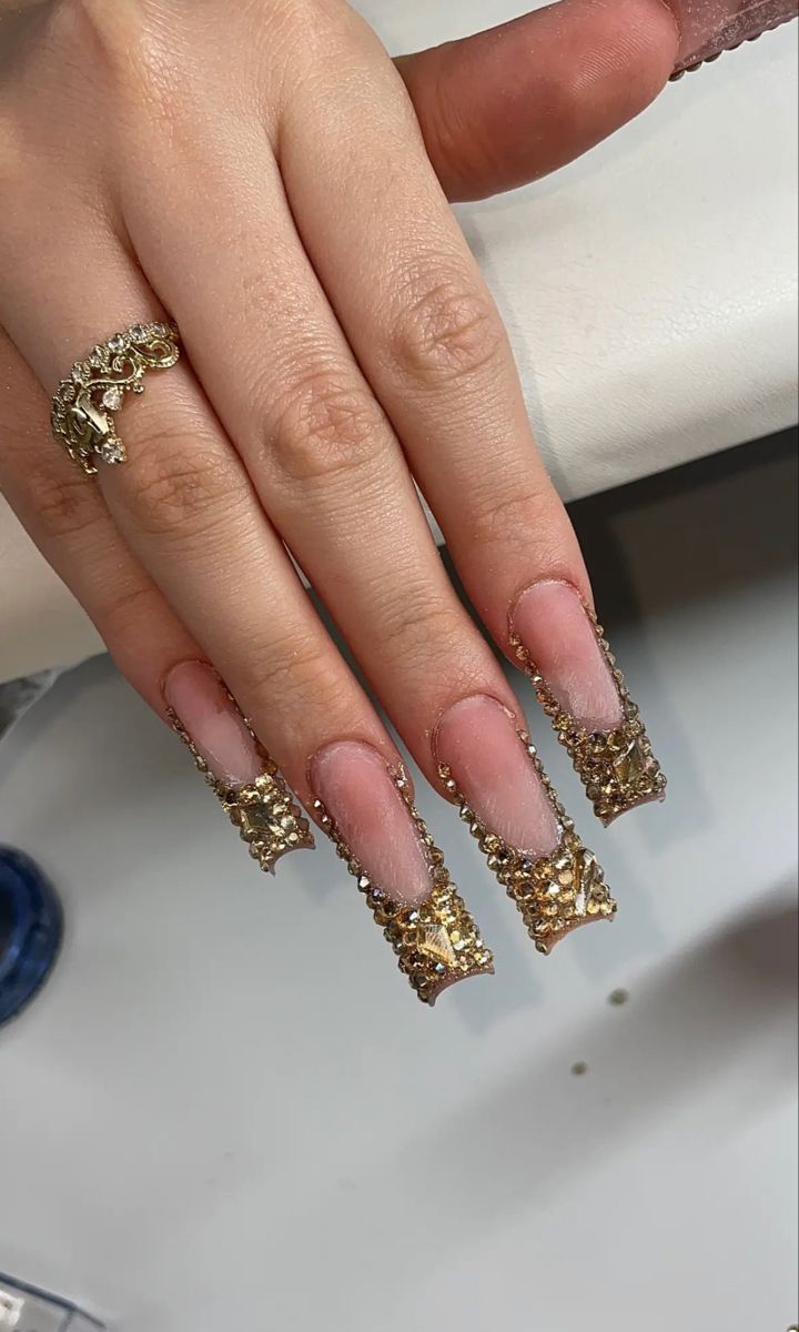 Elegant Long Square Nails with Opulent Gold Embellishments for a Bold Fashion Statement