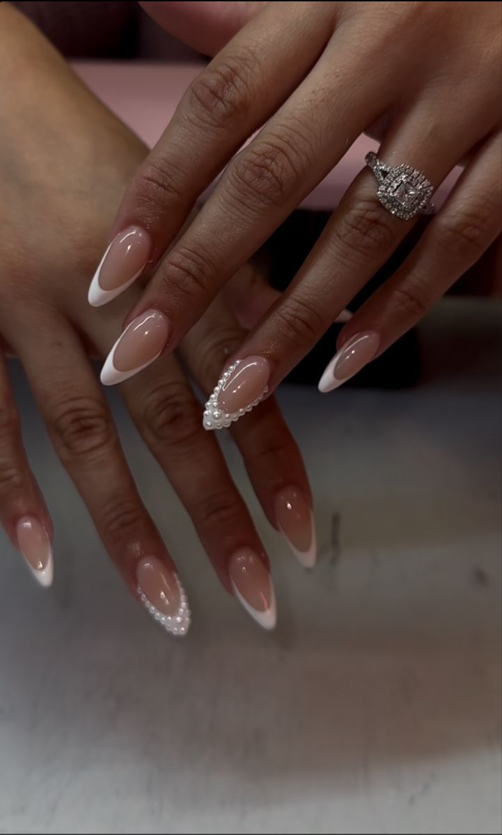 Chic Almond-Shaped French Manicure with Faux Pearls for Timeless Elegance.