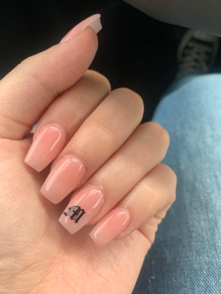 Elegant Pink French Tip Nail Design with Unique Detailing for Any Occasion.