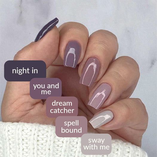 Stylish Deep Purple and Taupe Nail Design with Unique Patterns and Varying Lengths.