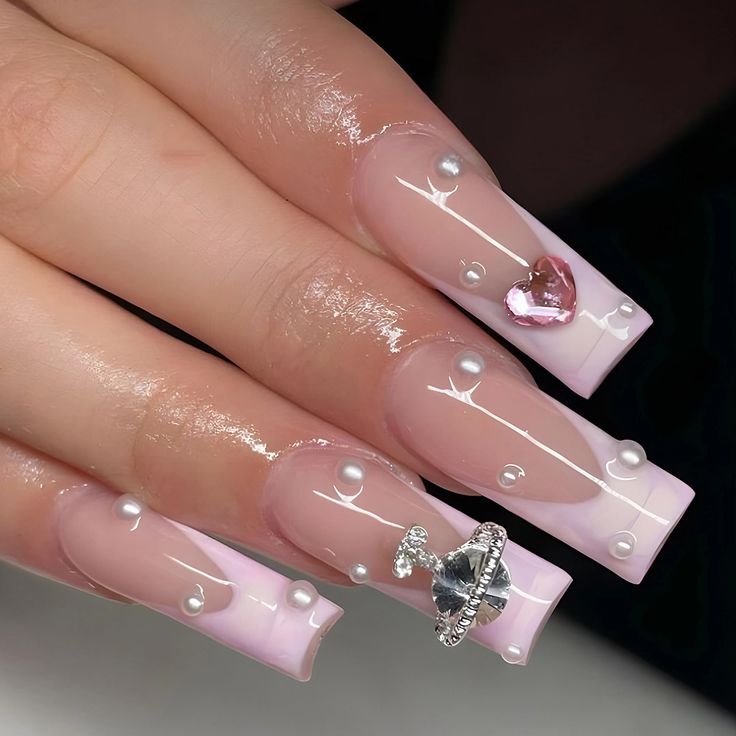 Chic Soft Pink Gradient Acrylic Nails with Pearl Accents and Sparkling Charms