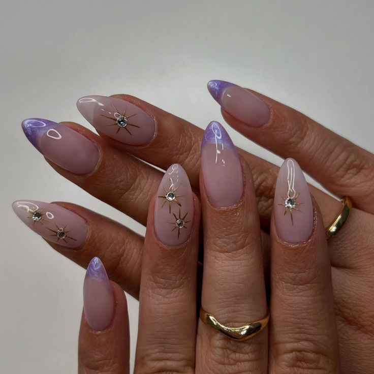 Chic Almond-Shaped Nails: Soft Pink Base with Lilac Tips and Star Embellishments