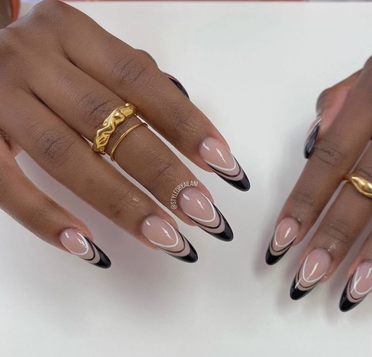 Chic Nude and Black Nail Design with Geometric White Accents