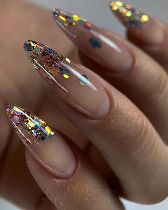 Holographic Almond-Shaped Nails: A Chic Blend of Sophistication and Playful Glamour.