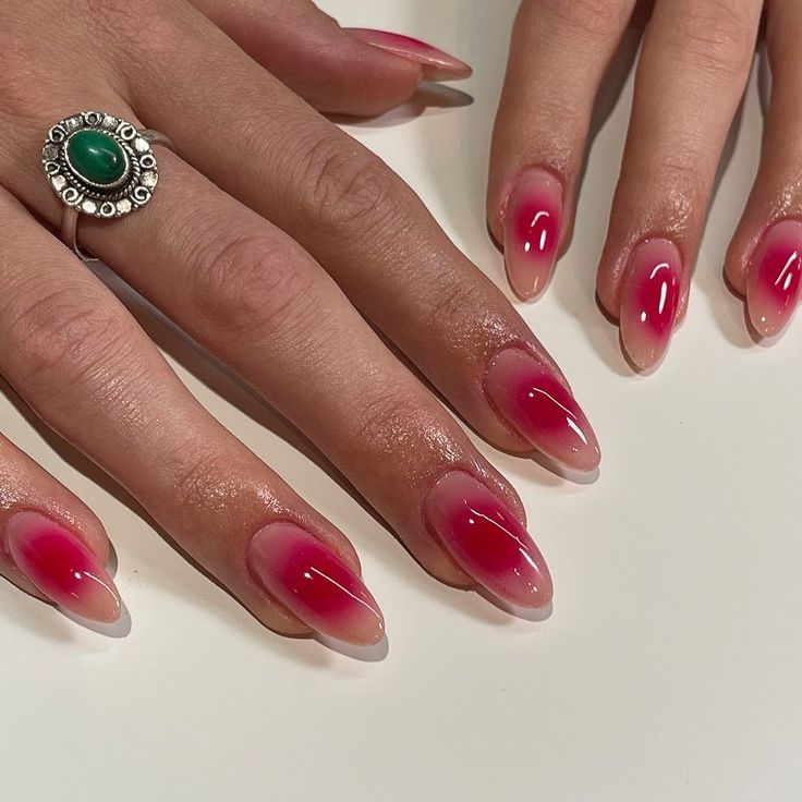 Chic Ombre Nail Design: Elegant Gradient from Nude to Vibrant Pink with Statement Ring