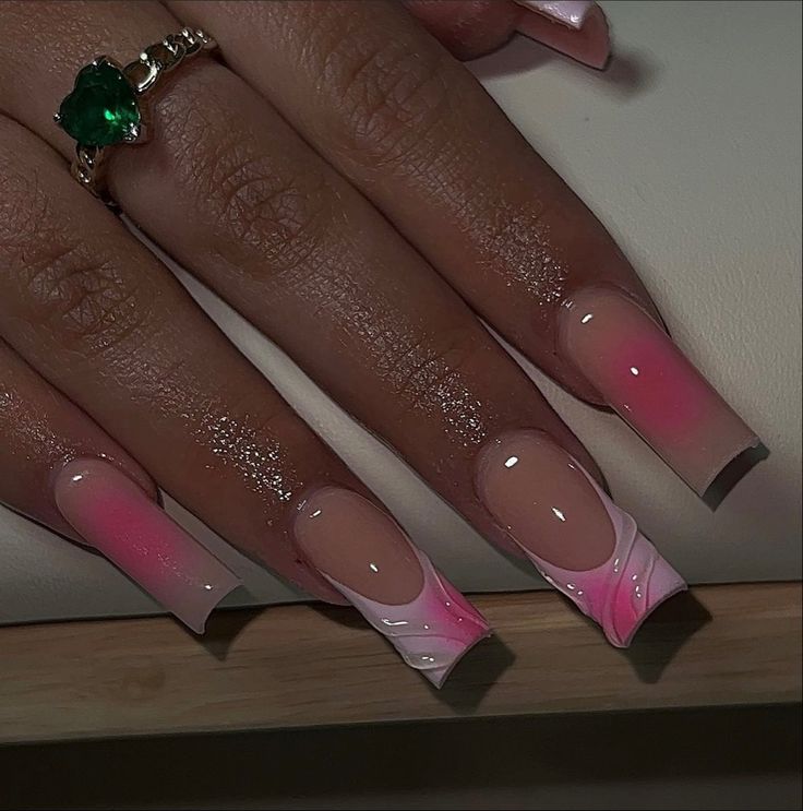 Elegant Ombre Nail Design with Pink and Nude Gradient accents and Stylish Swirl Pattern.