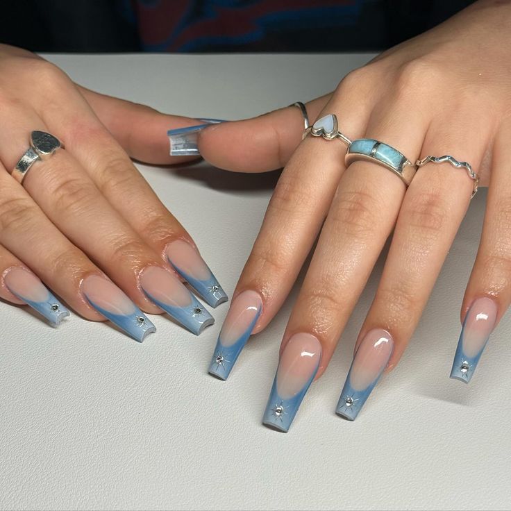 Chic Ombre Nail Design: Nude to Light Blue Gradient with Sparkling Silver Accents