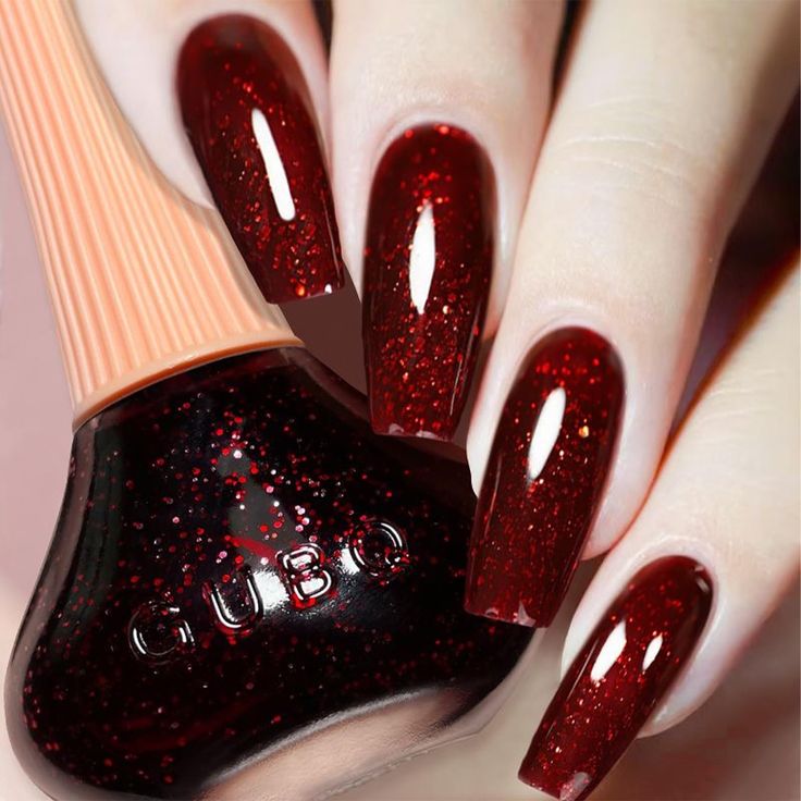 Glamorous Burgundy Nails: Sparkling Elegance for Special Occasions.