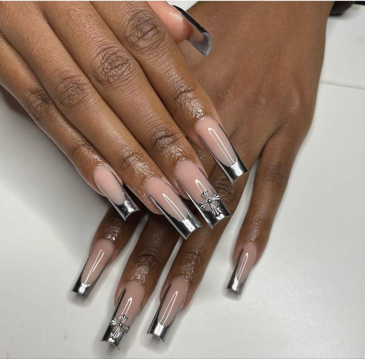 Sophisticated Nude and Silver Elongated Nail Design with Mirrored Metallic Finish