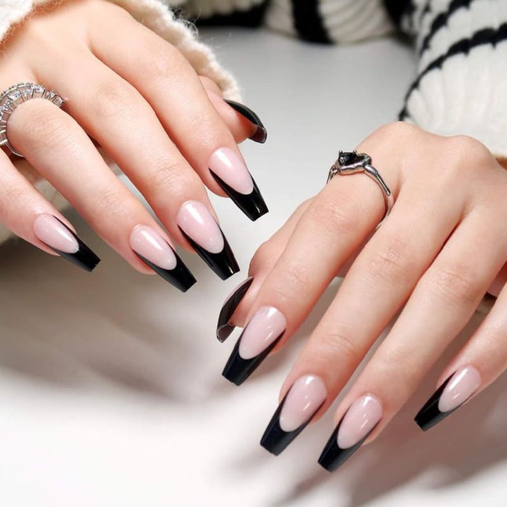 Chic Dual-Tone Nail Design: Elegant Soft Pink and Bold Black Almond Shape