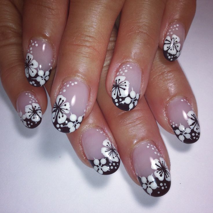 Chic Floral Nail Design with Gradient Shades and Artful Accents