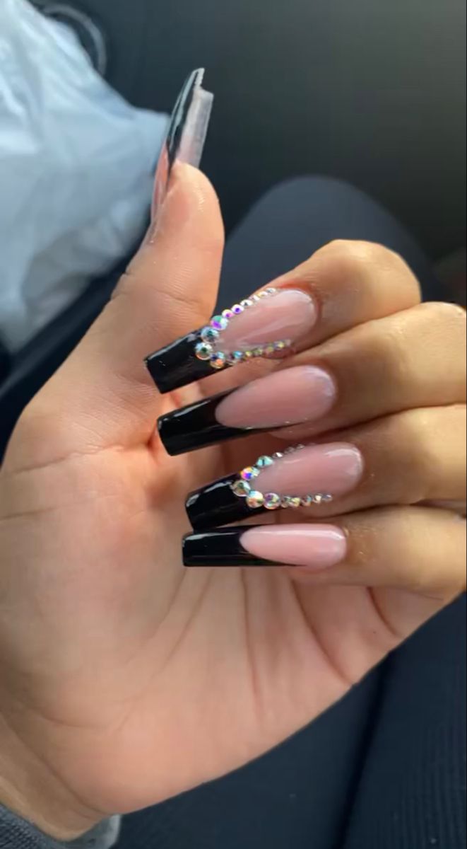 Elegant Acrylic Nails: Striking Nude and Black Tips with Rhinestone Glamour