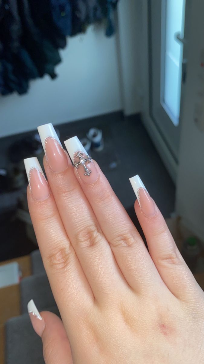 Chic French Tip Almond Nails with Sparkling Accent for Versatile Elegance