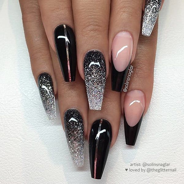 Elegant Almond-Shaped Nail Design with Glossy Black and Gradient Glitter