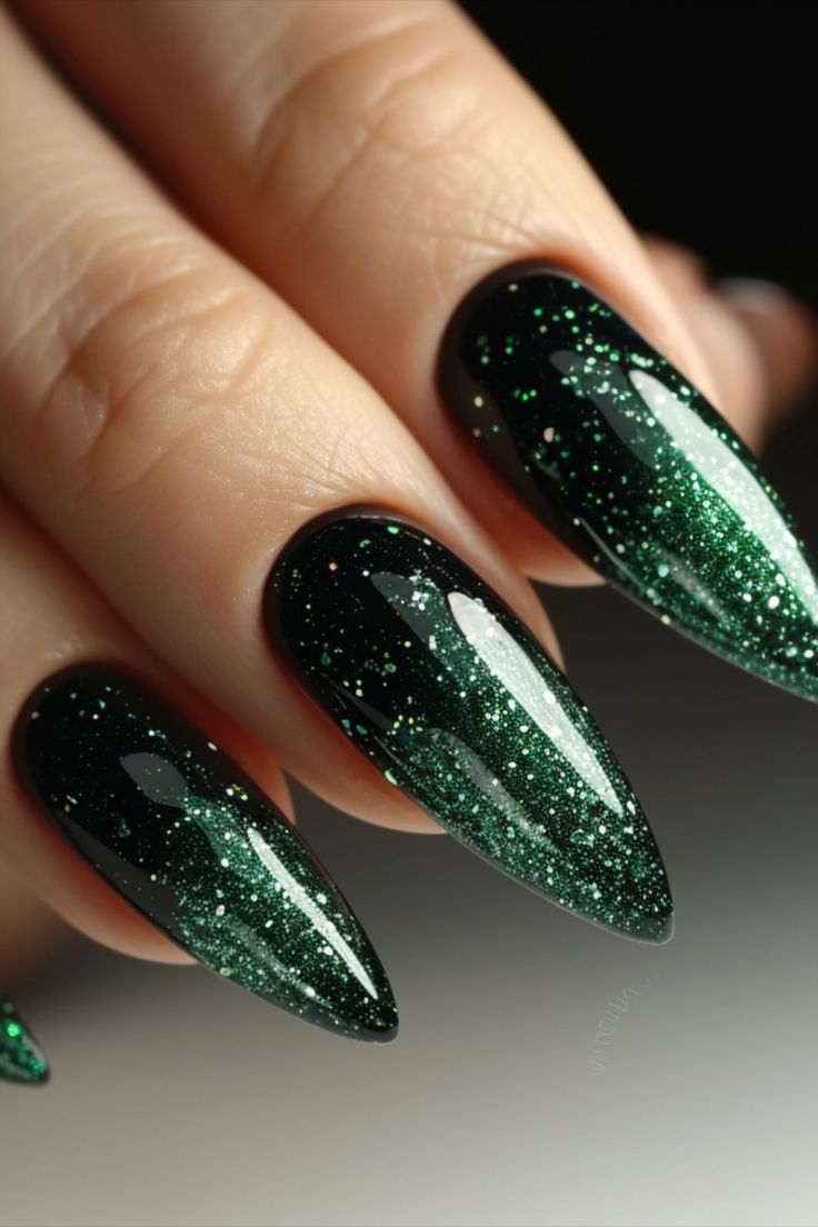 Glamorous Green Ombre Almond Nails with Glitter Gradient.