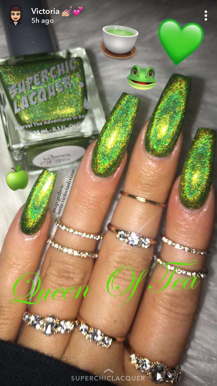 Elegant Sparkling Green Nail Design with Holographic Finish and Dainty Rings