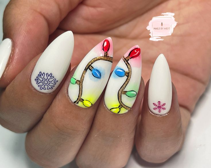 Whimsical Christmas Nail Design with Vibrant Lights and Snowflakes on a White Base