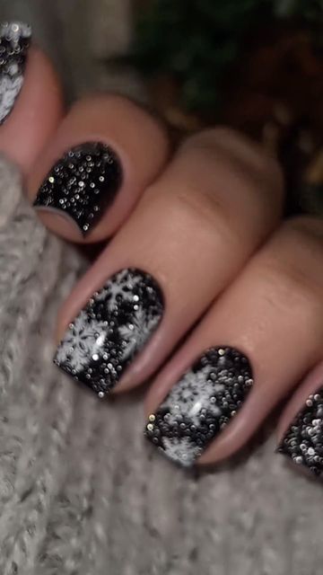 Sophisticated Black and White Nail Design with Shimmering Beads.