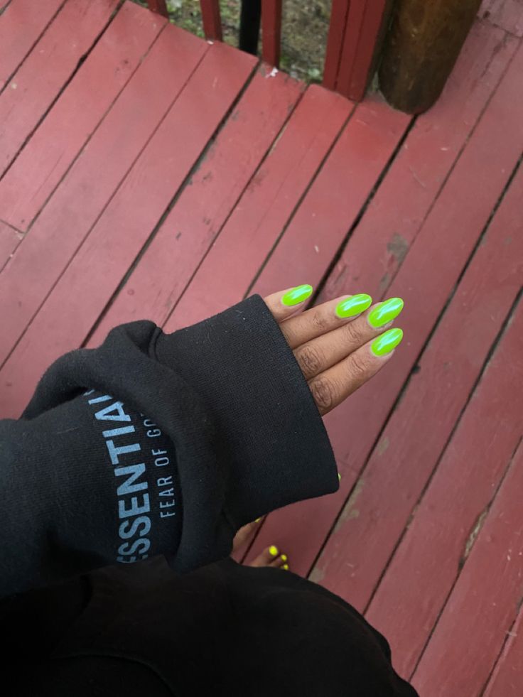 Bold Neon Green Nails: A Striking Blend of Elegance and Casual Comfort.