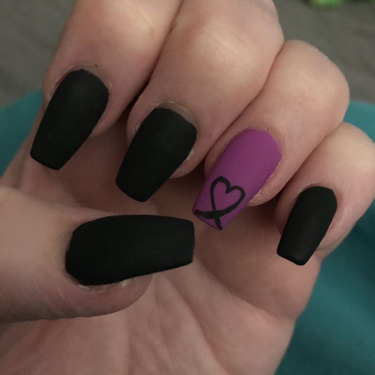 Chic Matte Black and Vibrant Purple Nail Design with Playful Heart Accent.