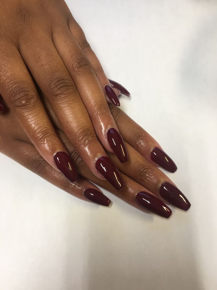 Sophisticated Almond-Shaped Burgundy Nails: A Timeless & Versatile Elegance