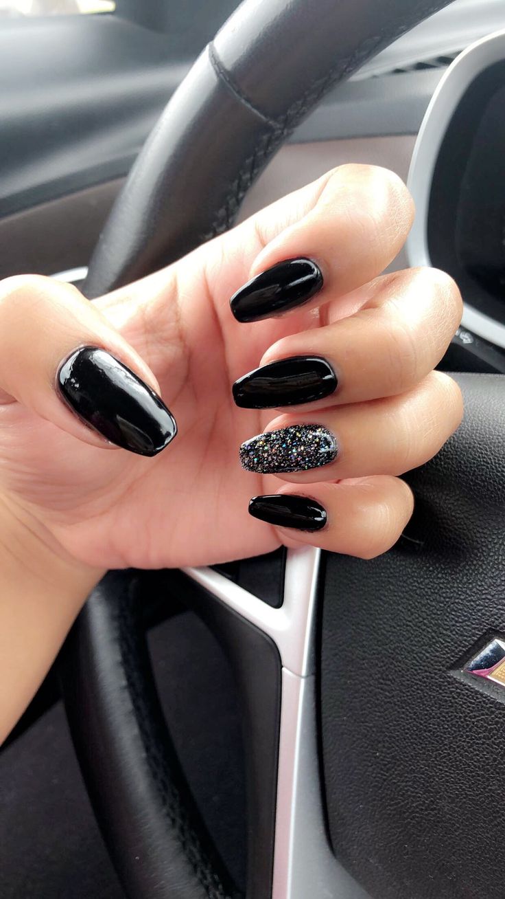 Chic Black Nails: Glossy Finish with Glamorous Rhinestone Accent