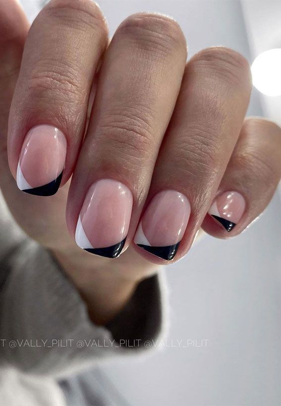 Chic Geometric Nail Design: Bold Accents on a Soft Nude Base.