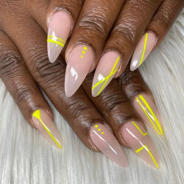 Vibrant Yellow Almond-Shaped Nails: A Chic Blend of Clean Lines and Bold Accents.