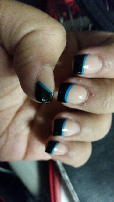 Modern Chic: Glossy Black-Tipped French Manicure with Turquoise Accent Stripe.