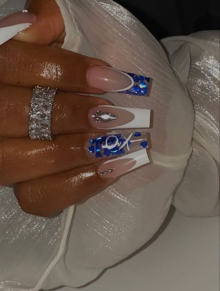 Chic Nail Design: Sparkling Blue and White Art with Elegant Nude Accents