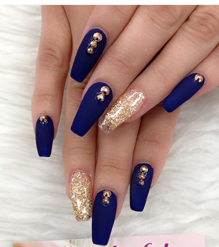 Chic Navy Blue Matte Nail Design with Glossy Gold Glitter and Rose Gold Gems.