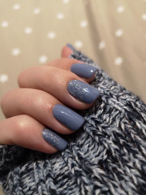 Chic Soft Blue Nails with Glossy Finish and Glitter Accent for Any Occasion