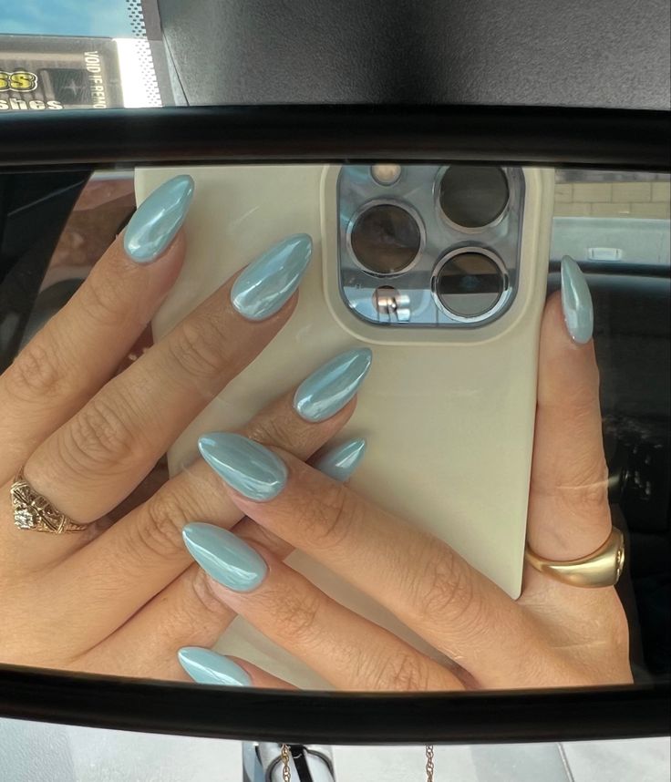 Elegant Soft Pastel Blue Almond Nails: A Chic, Seasonal Style.