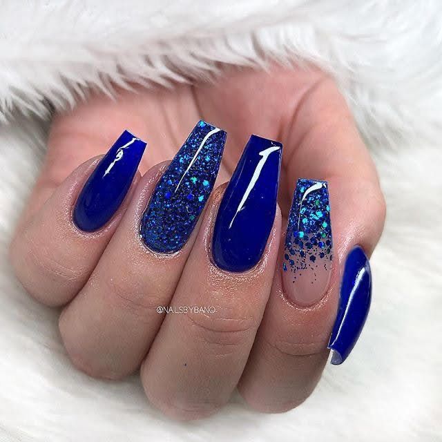 Striking Vibrant Blue Nail Design with Glossy and Glitter Finishes for Bold Glamour.