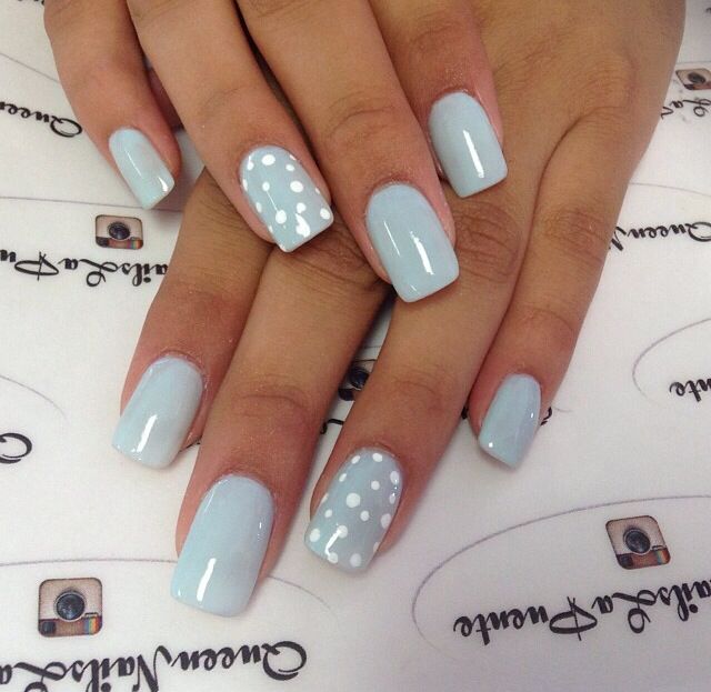 Serene Soft Pastel Blue Nails with Playful White Polka Dots for a Trendy Manicure.