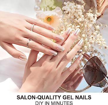 Chic Floral-Inspired Gel Nails with Shimmery Finish and Elegant Rings.