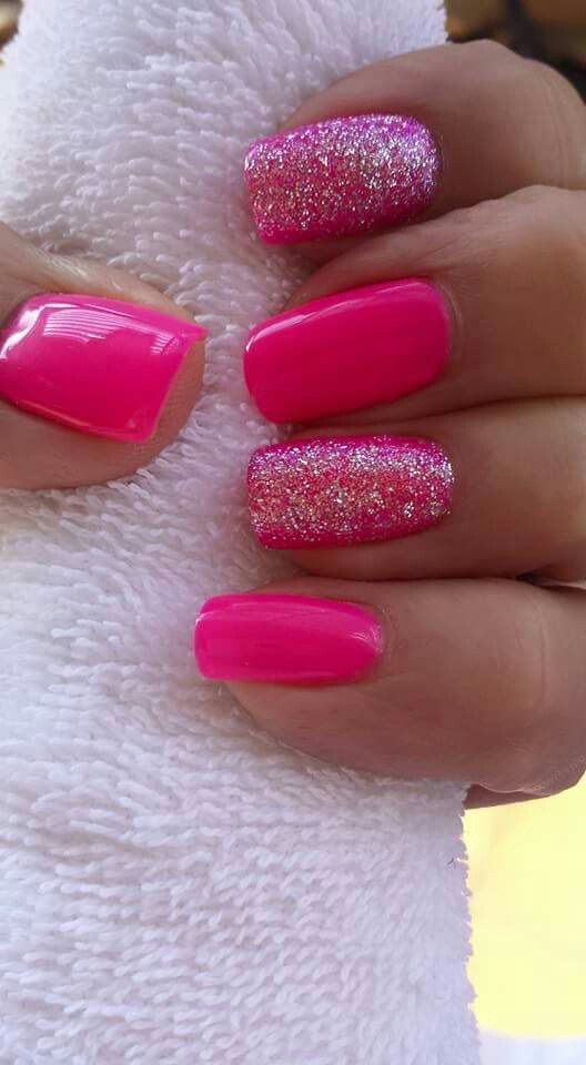 Playful Vibrant Pink Nail Design with Glossy and Glitter Accents