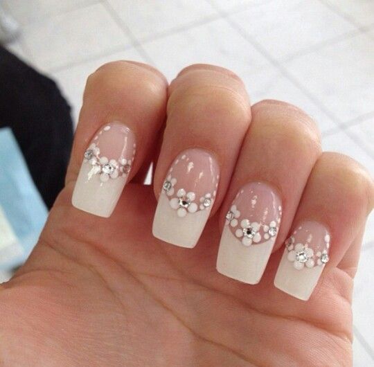 Sophisticated Ombre Nail Design with Floral Accents and Rhinestones