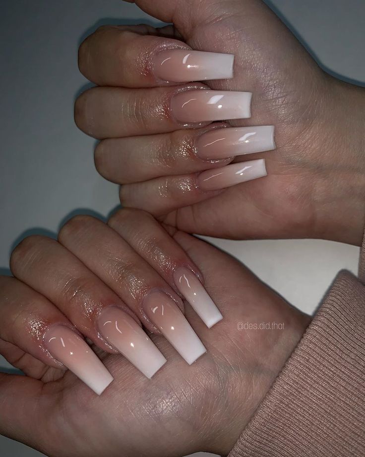 Elegant Ombre Long Nails: Chic Nude to White Gradient Design.