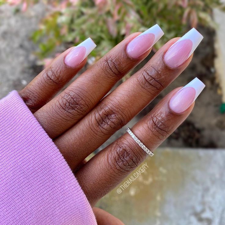 Chic Long Nude Acrylic Nails with Vibrant White Tips for Sophisticated Style