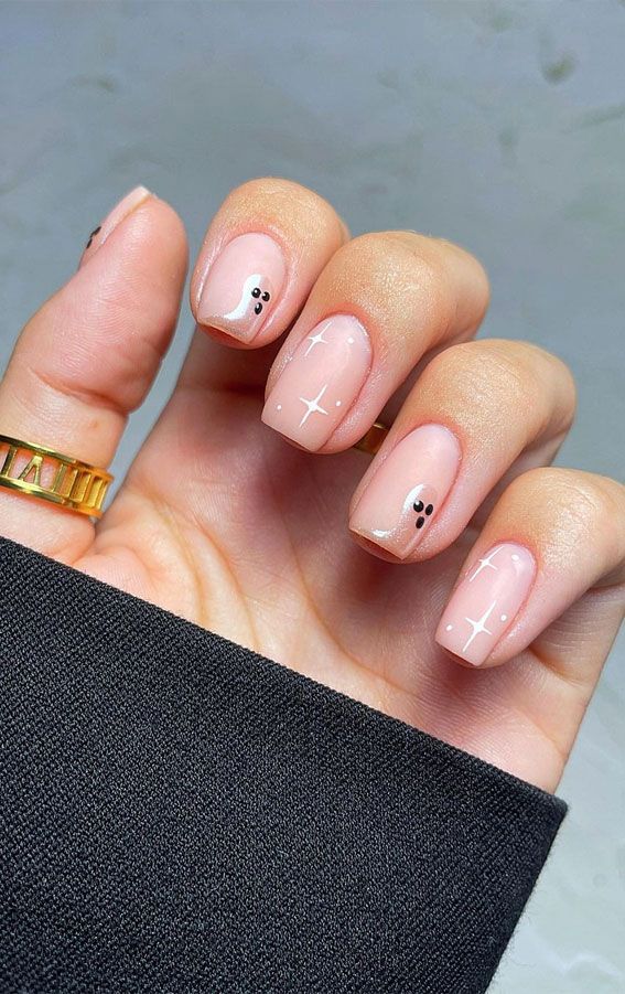 Chic Nail Design: Soft Nude Base with Minimalist Stripes and Playful Dots for Effortless Sophistication.