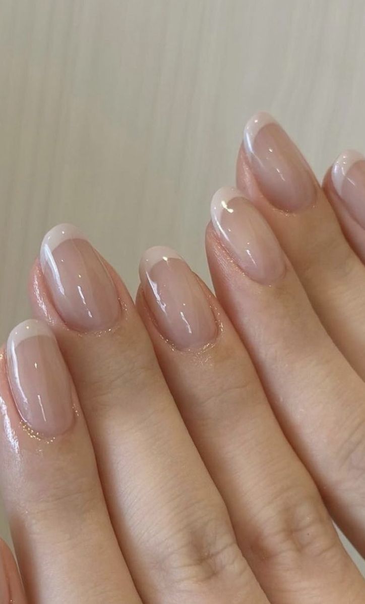 Elegant Nude Nails with Delicate French Tips for Timeless Sophistication.