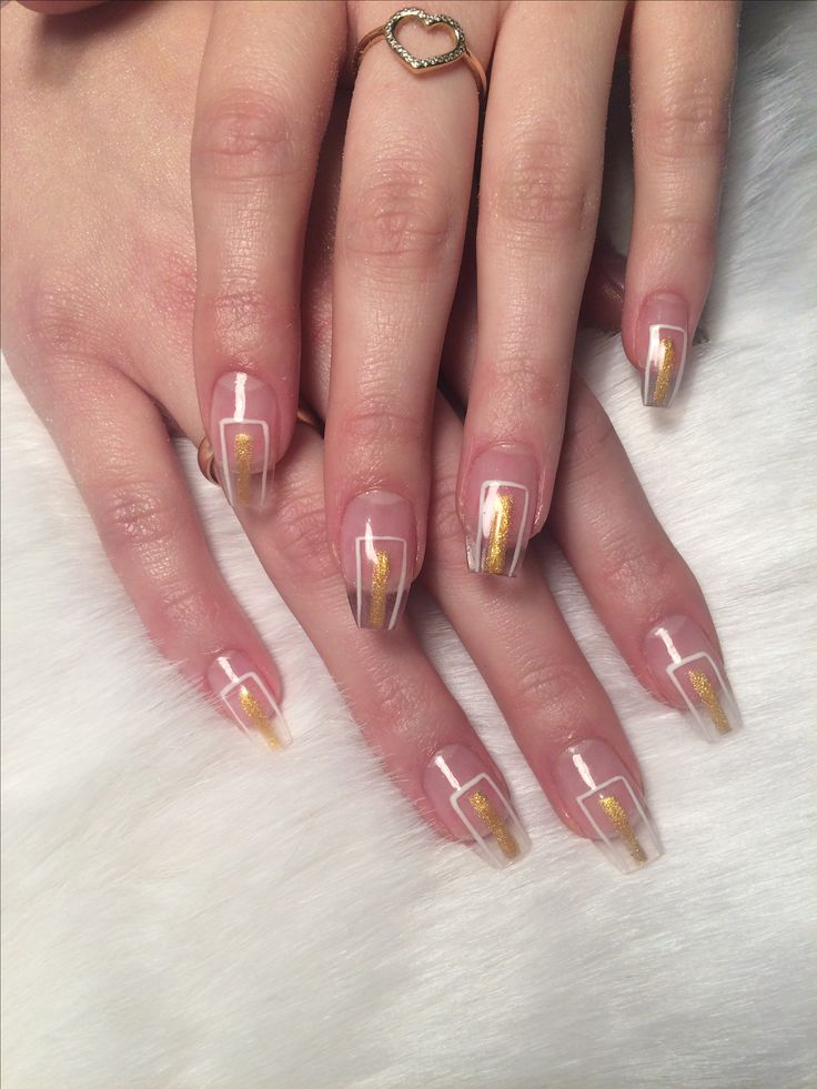 Sophisticated Nude Nail Design with Shimmering Gold Accents for Any Occasion.